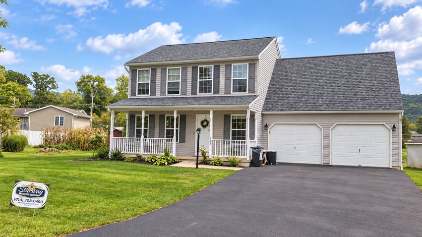 Sunny Gray Colonial Home Exterior
